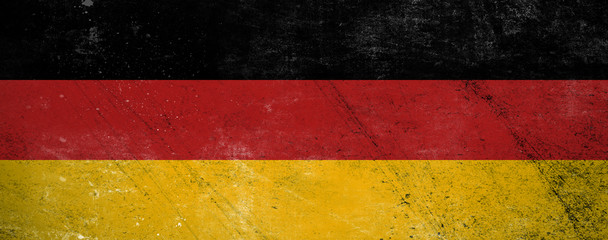 Grunge flag of Germany. Patriotic vintage texture background. Stock illustration.