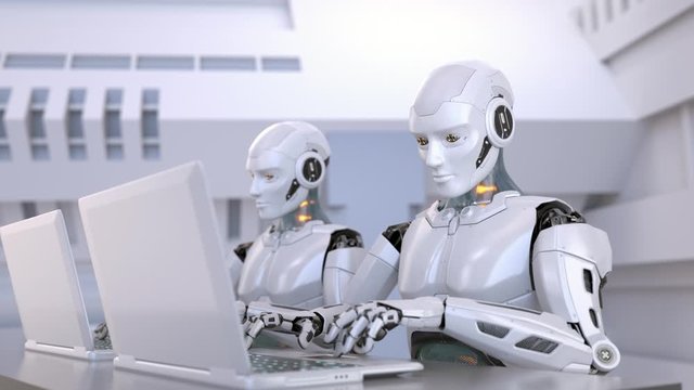 Two robots using laptop studying online or working distantly