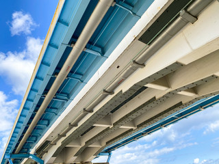 Underside of girder of steel bridge.