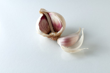 garlic bulb and clove on white background