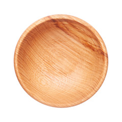 Wooden plate isolated on white background. Top view of empty dishware with space for text. Handcrafted cooking utensil