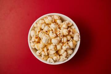 popcorn on pastel background.
