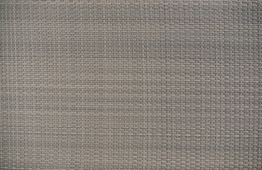 Rattan chair. A closed up background texture of a woven rattan chair.