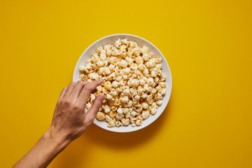popcorn on pastel background.