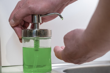 Washing hands rubbing with soap man for coronavirus prevention, hygiene to stop spreading covid-19.