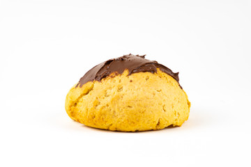 A cookie cake with chocolate on white background with copy space