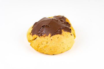 A cookie cake with chocolate on white background with copy space