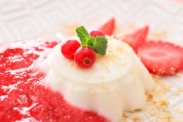 Plate with tasty panna cotta, closeup