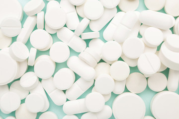 Many pills as background, top view