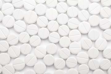Many pills as background, top view