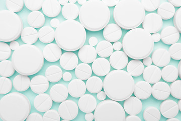 Many pills as background, top view