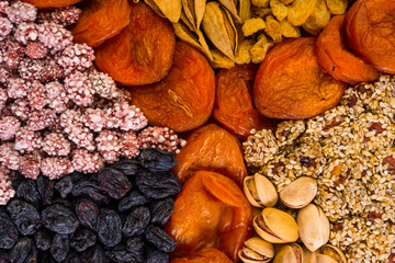 set of nuts, apricots, raisins, sesame, close up