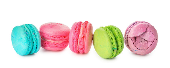 Tasty macarons on white background