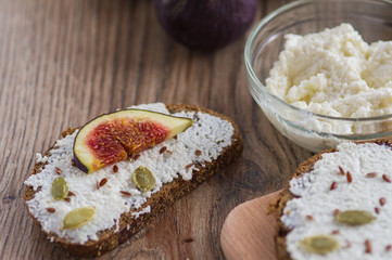 whole grain bread with curd cheese seeds and figs