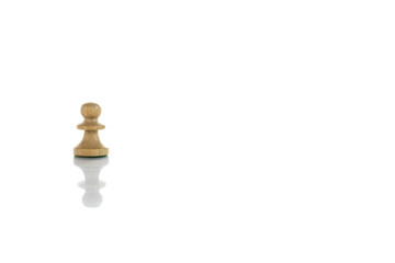 A view of pawn white chess piece. Wooden chess pieces against white color background