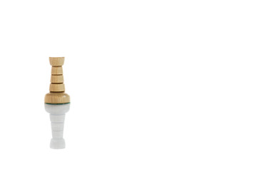 A view of tower white chess piece. Wooden chess pieces against white color background