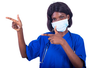 beautiful young female doctor pointing fingers aside.