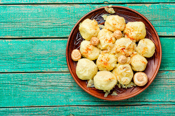 Homemade dumplings with mushrooms.