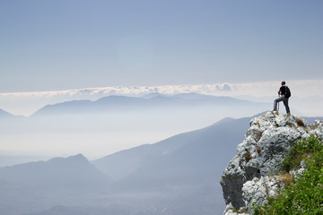 Hiker on the summit of a mountain