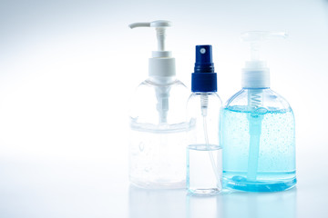 Fototapeta na wymiar Hand sanitizer gel pump bottle amd alcohol spray for Coronavirus disease (COVID-19) prevention home quarantine, health care concept