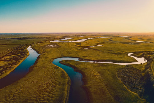 Aerial panorama of the rivers of the Astrakhan region in the spring. Akhtuba river.