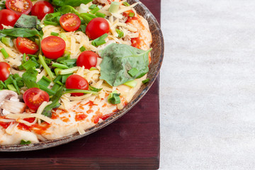 Homemade pizza before baking