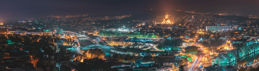 Tbilisi, Georgia. Cityscape Skyline In Night Illumination With Famous Landmarks. Rike Park, Holy Trinity Cathedral Or Sameba, Saint George Armenian Cathedral, Metekhi Church In Old Historic District