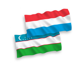 Flags of Uzbekistan and Luxembourg on a white background
