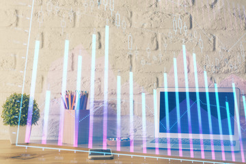 Financial graph colorful drawing and table with computer on background. Multi exposure. Concept of international markets.