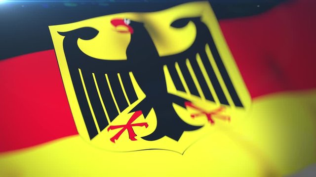 Flag of Germany waving in the wind on a sunny day, extreme close-up
