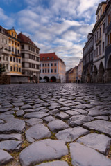 Lower Market Square (Ubermarkt) of Goerlitz Germany with old houses, arcades, stone paving. Selecrive focus, blurred background.