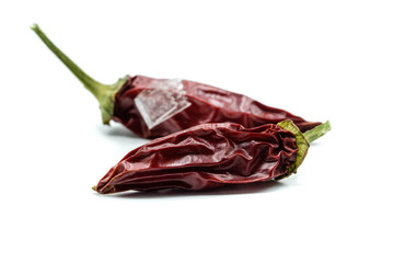 dried hot peppers isolated on white background