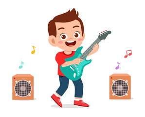happy cute little kid boy play guitar