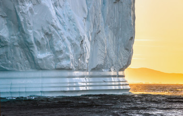 Fototapeta na wymiar Icebergs at Sunset. Disko Bay, Western Greenland.