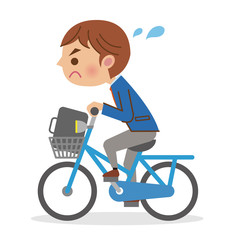 必死に自転車を漕ぐ男子学生