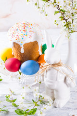 Beautiful easter concept with flowers and easter cake