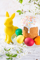 Beautiful easter concept with flowers and easter cake