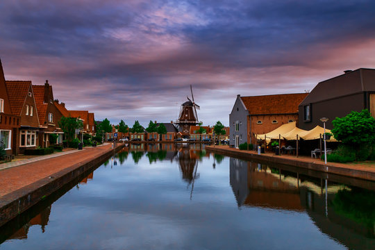 Water canal in Meppel, Holland at sunrise. The background is the sky with clouds.