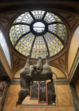PRAGUE. CZECH REPUBLIC. 12 AUGUST 2019 : Sculpture Horse (Kun) by David Cerny at Lucerna Arcade in Prague. Czech Republic