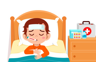 sad cute kid boy lay in bed sick
