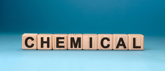 CHEMICAL word cube on a blue background. Medical concept.