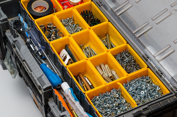 Closeup of a set of manual tools in an organizer. Very high quality.
