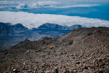 Volcanic rocks higher than the clouds on Teide mountain in Tenerife, Spain