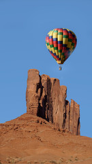 Fototapeta na wymiar Hot air balloon over Monument Valley Arizona