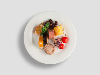Salad, smoked pork chops, chicken, mushrooms, prosciutto, spinach, cheese, grapes, nuts, cedar cheese, tuna, tomatoes, olives, fish. Viewed 360 or top view.