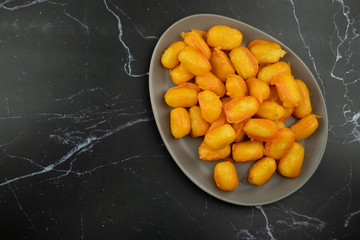 Golden Jackfruit Seeds, mung bean marzipan and egg yolk dessert (Thai called : Met Khanoon)