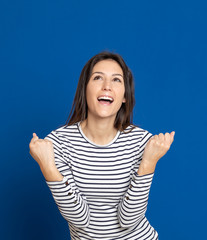 Fototapeta premium Brunette young woman wearing a striped T-shirt