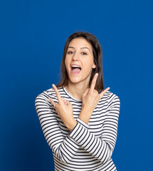 Fototapeta premium Brunette young woman wearing a striped T-shirt