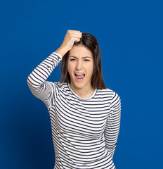 Brunette young woman wearing a striped T-shirt