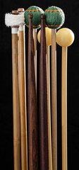Percussion mallets on black background